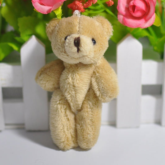 miniature fuzzy teddy bear